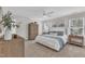 Tranquil bedroom with neutral tones, a ceiling fan, and well-coordinated furniture at 3181 Zebroid Way, New Hill, NC 27562