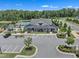 Community clubhouse featuring a swimming pool, playground, parking, and green space at 3181 Zebroid Way, New Hill, NC 27562