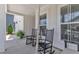 Charming rocking chairs on the front porch add to the home's appeal at 3181 Zebroid Way, New Hill, NC 27562