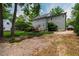 Large backyard featuring a lush lawn, mature trees, a patio, and ample space for outdoor activities at 3304 Buck Run Trl, Wake Forest, NC 27587
