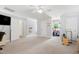 Large bonus room with multiple doors, ample space, carpet, and natural light at 3304 Buck Run Trl, Wake Forest, NC 27587