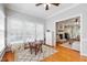 Bonus room with a rug and play table in a light and airy space at 3304 Buck Run Trl, Wake Forest, NC 27587