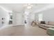 Expansive bonus room with natural light, carpet, seating, and play areas at 3304 Buck Run Trl, Wake Forest, NC 27587