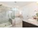 Bright bathroom with granite counter tops, a tub, and a glass shower at 3361 Bordwell Ridge Dr. Dr, New Hill, NC 27562