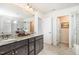 Modern bathroom with double vanity, granite countertop, walk-in shower and soaking tub at 3361 Bordwell Ridge Dr. Dr, New Hill, NC 27562