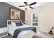 Cozy bedroom with a comfortable bed, neutral colors, and a ceiling fan at 3361 Bordwell Ridge Dr. Dr, New Hill, NC 27562