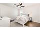 Bedroom featuring a white bed, wood floors, white rug, and small side table at 3361 Bordwell Ridge Dr. Dr, New Hill, NC 27562