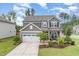 Charming two-story home with a manicured front yard and a two-car garage with stone accents at 3361 Bordwell Ridge Dr. Dr, New Hill, NC 27562