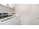 Laundry room featuring modern white washer and dryer with upper cabinets at 3361 Bordwell Ridge Dr. Dr, New Hill, NC 27562