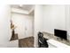 A cozy office nook space with modern granite desk and a side entry door at 3361 Bordwell Ridge Dr. Dr, New Hill, NC 27562