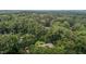 An aerial view showing the tree coverage and seclusion of the property at 3600 Trail 23 St, Durham, NC 27707