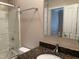 Bathroom with a shower, granite vanity, and decorative mirror at 3600 Trail 23 St, Durham, NC 27707