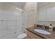 Bathroom with a shower and bathtub combination with tile floor and vanity at 3600 Trail 23 St, Durham, NC 27707