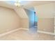 Charming bedroom featuring plush carpeting and dormer windows for plenty of light at 3600 Trail 23 St, Durham, NC 27707