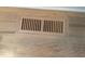 Hardwood floors with a modern floor vent at 3600 Trail 23 St, Durham, NC 27707