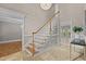 Spacious foyer with staircase, marble flooring, chandelier, and entry to multiple rooms with an open design at 3600 Trail 23 St, Durham, NC 27707