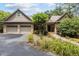 Beautiful home with a three-car garage, brick accents, and landscaped front yard at 3600 Trail 23 St, Durham, NC 27707