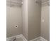 Laundry room with hook ups and tile flooring at 3600 Trail 23 St, Durham, NC 27707
