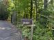 Mailbox for the property at 3600 nestled among lush greenery at 3600 Trail 23 St, Durham, NC 27707