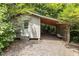 Charming outbuilding with covered parking, perfect for storage or hobbies in a peaceful setting at 3600 Trail 23 St, Durham, NC 27707