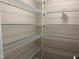 Walk-in closet with adjustable white wire shelving at 3600 Trail 23 St, Durham, NC 27707