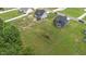 Aerial view of the homes in the neighborhood with large yards and mature trees at 385 Jackson Pond Dr, Smithfield, NC 27577