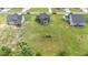 Aerial view of the home situated on a large lot with a playground in the backyard at 385 Jackson Pond Dr, Smithfield, NC 27577