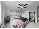 Comfortable bedroom featuring a ceiling fan, neutral walls, and carpeted floors at 385 Jackson Pond Dr, Smithfield, NC 27577