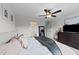Comfortable bedroom featuring a ceiling fan, neutral walls, and carpeted floors at 385 Jackson Pond Dr, Smithfield, NC 27577