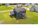Aerial view of the home's backyard with a covered porch at 385 Jackson Pond Dr, Smithfield, NC 27577