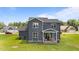 Aerial view of the home's backyard with a covered porch at 385 Jackson Pond Dr, Smithfield, NC 27577