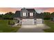 Charming two-story home with a spacious driveway, two-car garage, and covered front porch at 385 Jackson Pond Dr, Smithfield, NC 27577
