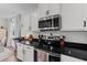 Well-equipped kitchen with stainless steel appliances and ample cabinet space at 385 Jackson Pond Dr, Smithfield, NC 27577