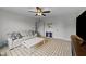 Inviting living room with a large window, ceiling fan, and patterned area rug at 385 Jackson Pond Dr, Smithfield, NC 27577