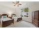 Bedroom featuring two twin beds and a window offering a comfortable and welcoming space at 400 Indian Elm Ln, Cary, NC 27519