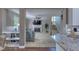 Inviting living room with a fireplace, plush carpet, and plenty of natural light at 405 Widdington Ln, Cary, NC 27519