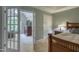 A view from the Primary suite into an ensuite sitting room with television at 405 Widdington Ln, Cary, NC 27519