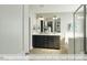 Bathroom with dual vanity, soaking tub, and glass shower at 409 Falls Bluff Dr, Wake Forest, NC 27596