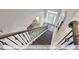 View looking down the stairs to the entryway and front door at 409 Falls Bluff Dr, Wake Forest, NC 27596