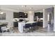 Kitchen with island, quartz countertop and stainless steel appliances at 409 Falls Bluff Dr, Wake Forest, NC 27596