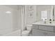 Clean bathroom with a tub, shower, toilet, vanity, and mirror at 413 Falls Bluff Dr, Wake Forest, NC 27587