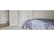 Cozy bedroom featuring a bed, closet, and carpeted floors at 413 Falls Bluff Dr, Wake Forest, NC 27587