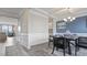 Elegant dining room featuring a coffered ceiling and stylish decor at 413 Falls Bluff Dr, Wake Forest, NC 27587