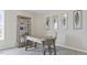 Bright home office featuring a modern desk, bookshelf, and natural light at 413 Falls Bluff Dr, Wake Forest, NC 27587