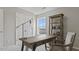 Well-lit home office featuring a desk, shelving, and neutral decor at 413 Falls Bluff Dr, Wake Forest, NC 27587