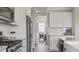Well-designed kitchen with subway tile backsplash and stainless steel appliances at 413 Falls Bluff Dr, Wake Forest, NC 27587
