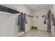 A spacious walk-in closet with built-in shelving and ample storage at 413 Falls Bluff Dr, Wake Forest, NC 27587