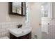 Bathroom featuring a vanity with a white sink and bronze fixtures at 418 Ridgefield Rd, Chapel Hill, NC 27517