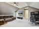 Large living room featuring a sofa, a TV, and a desk at 4221 Bibleway Ct, Holly Springs, NC 27540