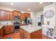 Spacious kitchen with stainless steel appliances, granite countertops and center island at 425 Cottonseed Way, Durham, NC 27703